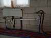 Установка радиаторов, теплого пола, монтаж санузлов и канализации, монтаж котлов и котельной в коттедже 400 кв.м.